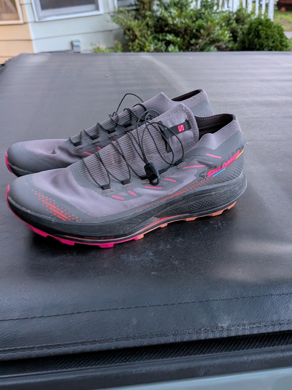Salomon Gray Trail Running Shoes with Pink Highlights